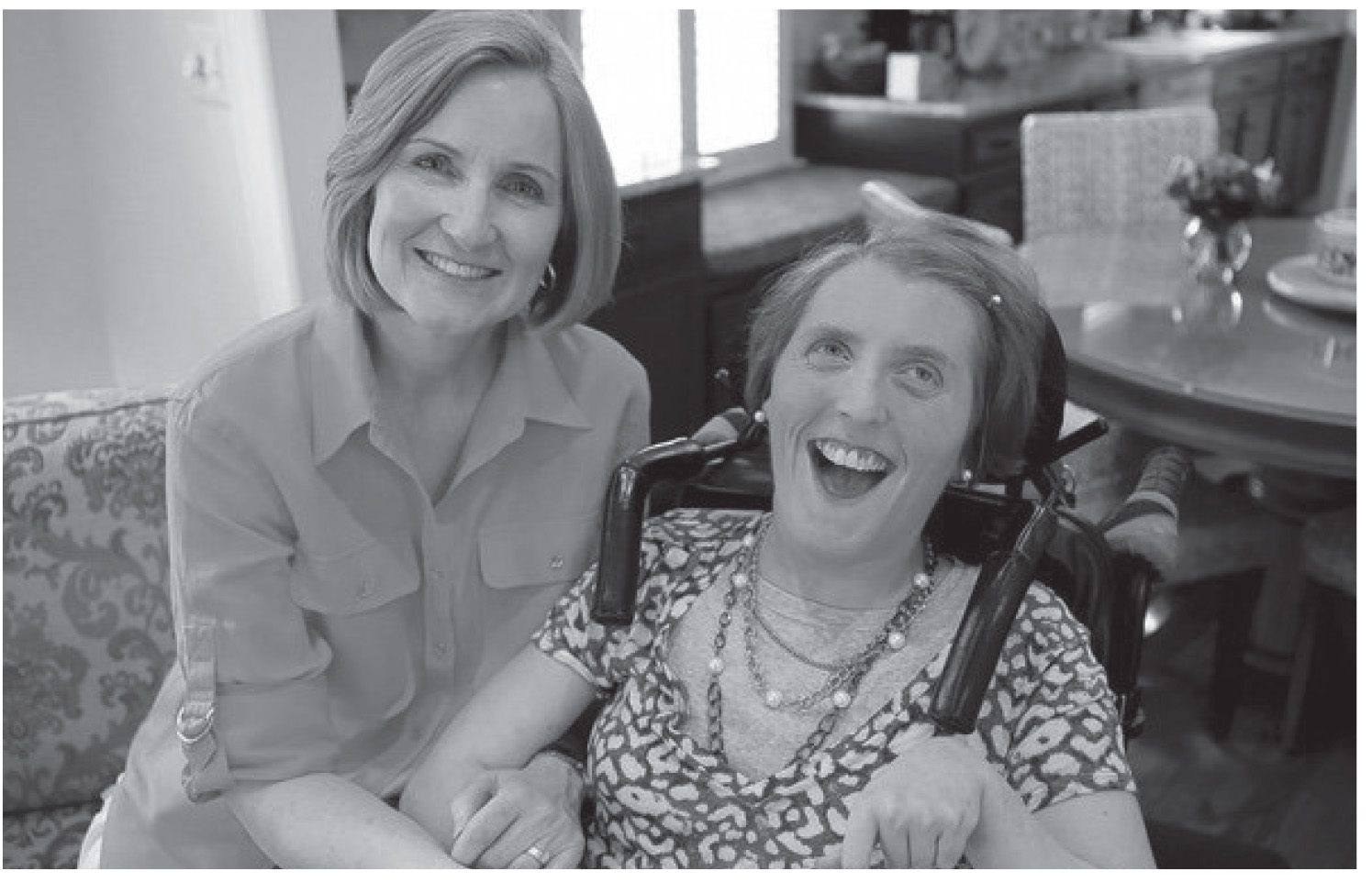 Harris v. Quinn plaintiff Susie Watts (left) said her victory against forced dues for homecare providers was really a win for her disabled daughter Libby: “It’s not even about me as a homecare provider…They’re her benefits that are being siphoned off.”
